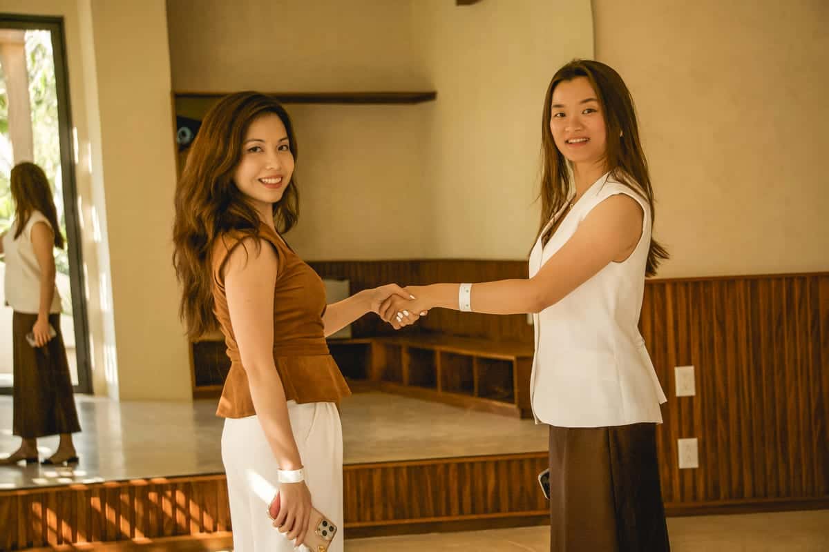 HavenStone founder greeting a colleague with a handshake