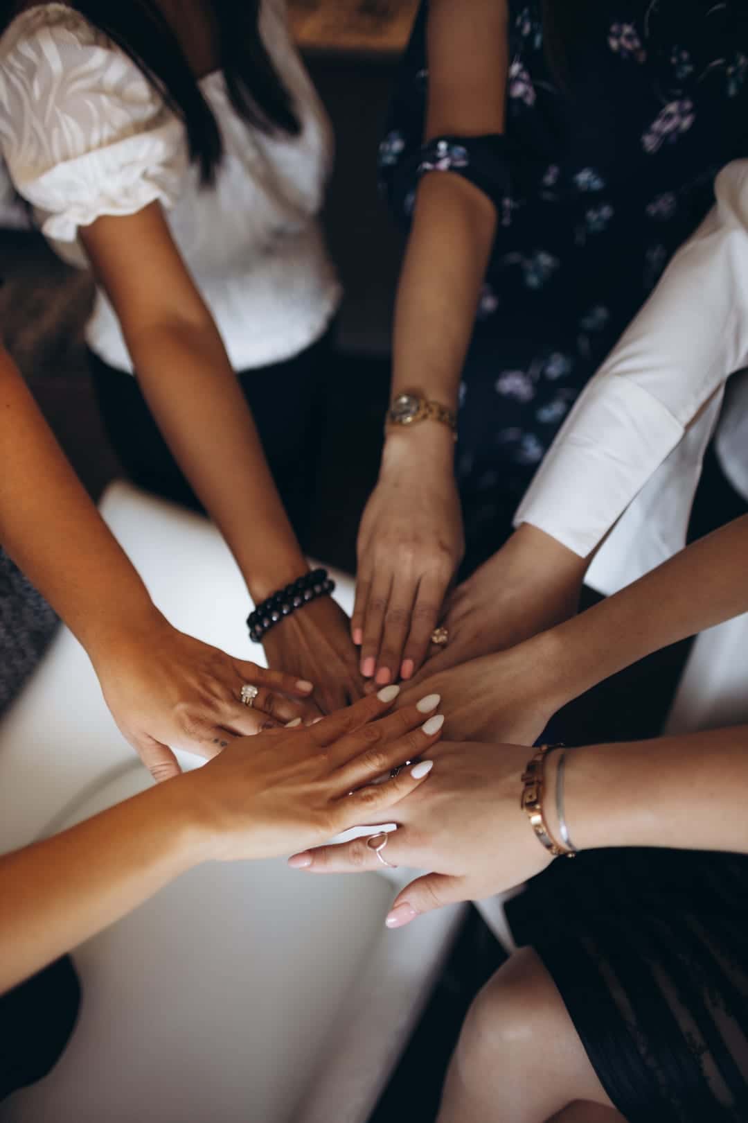 HavenStone team members joining their hands together as a sign of teamwork